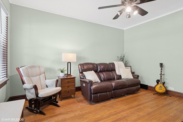 420 Blackhawk Dr, Westmont, IL 60559 - living room with a ceiling fan, light wood finished floors, baseboards, and crown molding
