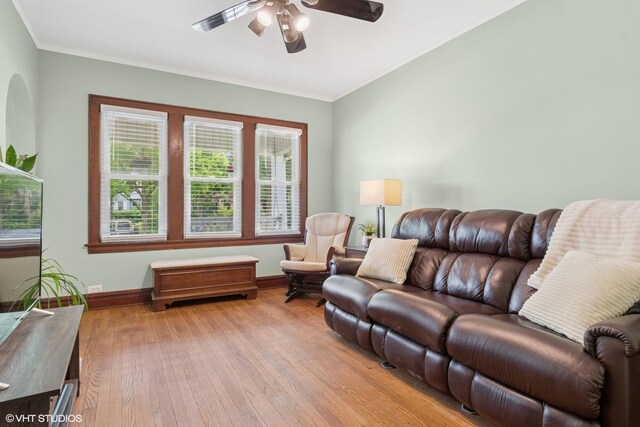 420 Blackhawk Dr, Westmont, IL 60559 - living room featuring ceiling fan, plenty of natural light, wood finished floors, baseboards, and ornamental molding