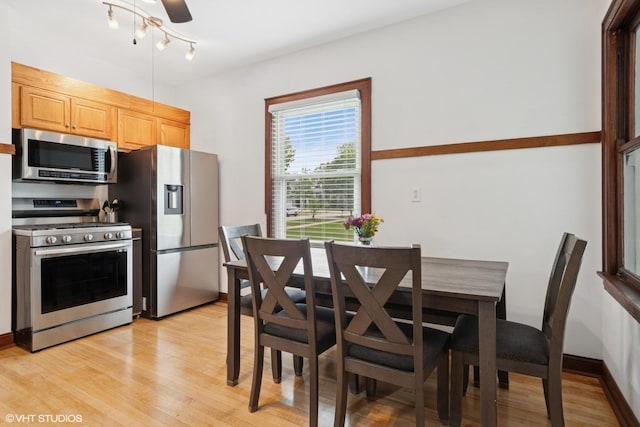 420 Blackhawk Dr, Westmont, IL 60559 - kitchen with appliances with stainless steel finishes, light wood-style floors, light brown cabinetry, and ceiling fan