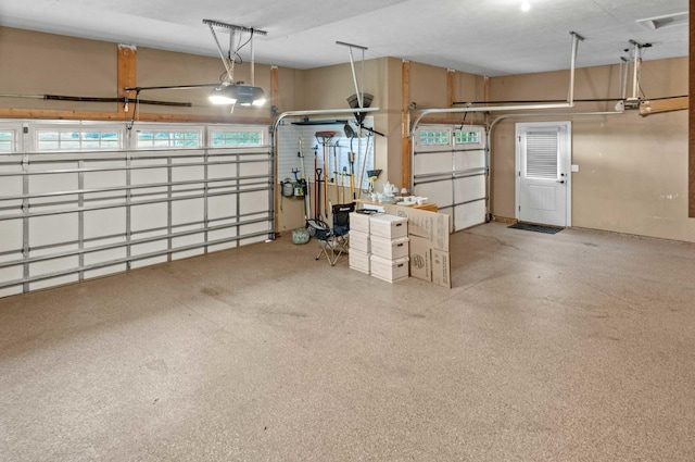 4 Emerald Crest Ct, Bloomington, IL 61705 - garage featuring a garage door opener