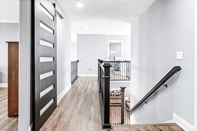 4 Emerald Crest Ct, Bloomington, IL 61705 - hall with an upstairs landing, light wood-type flooring, and recessed lighting