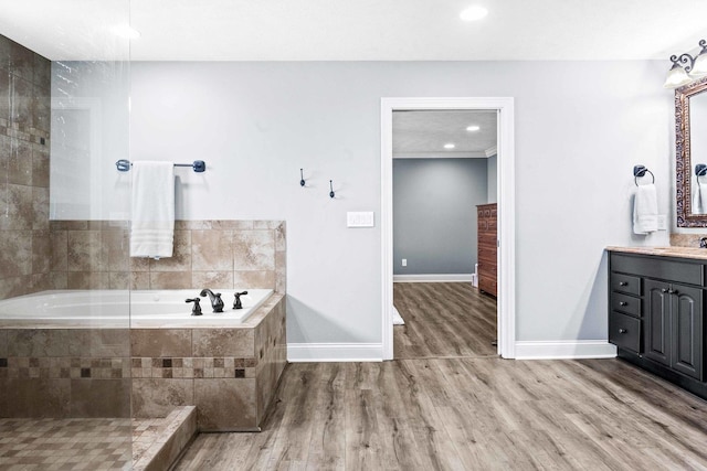 4 Emerald Crest Ct, Bloomington, IL 61705 - full bathroom featuring vanity, a garden tub, wood finished floors, and recessed lighting