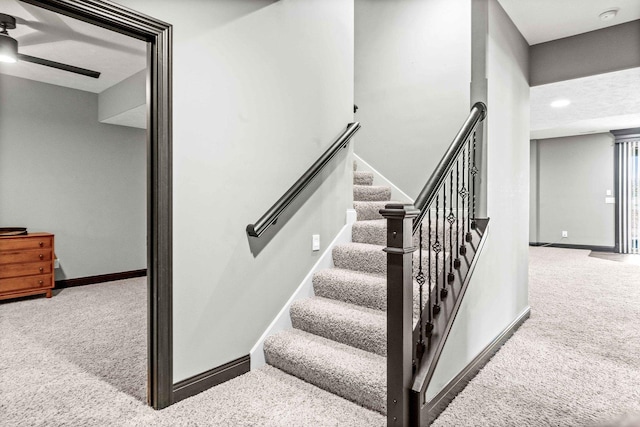4 Emerald Crest Ct, Bloomington, IL 61705 - stairway with carpet and a ceiling fan