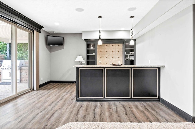 4 Emerald Crest Ct, Bloomington, IL 61705 - bar with wood finished floors and pendant lighting