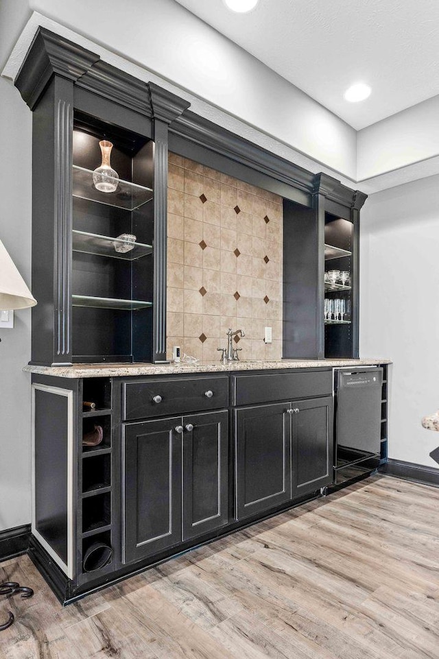 4 Emerald Crest Ct, Bloomington, IL 61705 - indoor wet bar with dishwasher, light wood-style floors, and tasteful backsplash