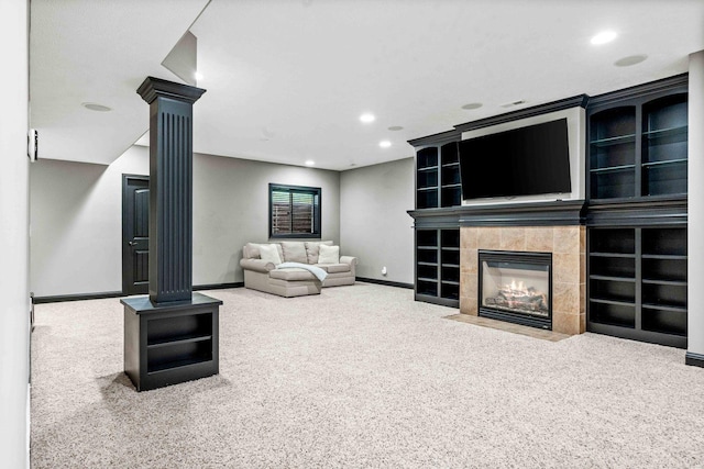 4 Emerald Crest Ct, Bloomington, IL 61705 - living room with carpet floors, decorative columns, a tile fireplace, and recessed lighting