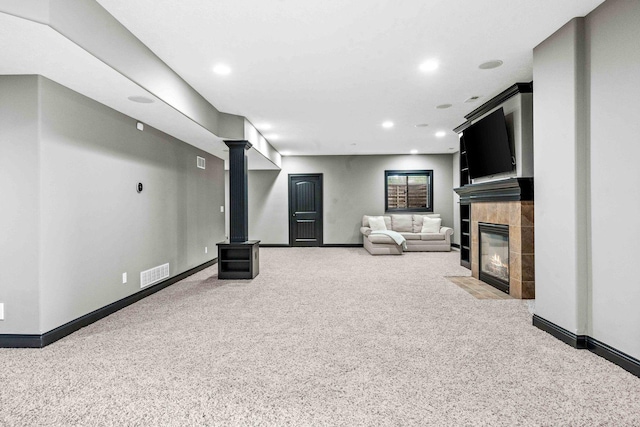 4 Emerald Crest Ct, Bloomington, IL 61705 - unfurnished living room with carpet floors, a fireplace, recessed lighting, and a wood stove