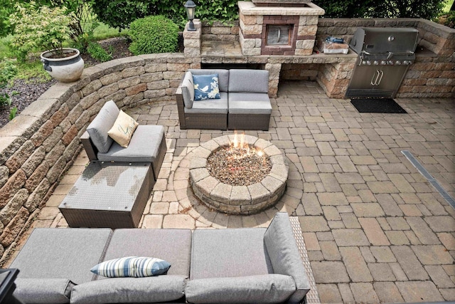 4 Emerald Crest Ct, Bloomington, IL 61705 - view of patio featuring an outdoor kitchen and an outdoor hangout area
