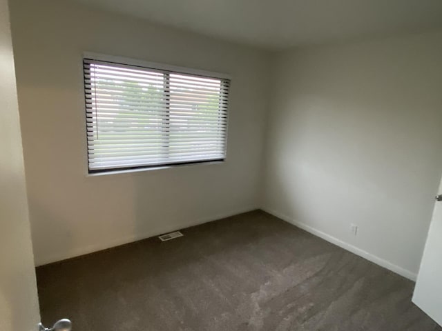 2356 Carnation Dr Unit 0, Crest Hill, IL 60403 - spare room featuring carpet