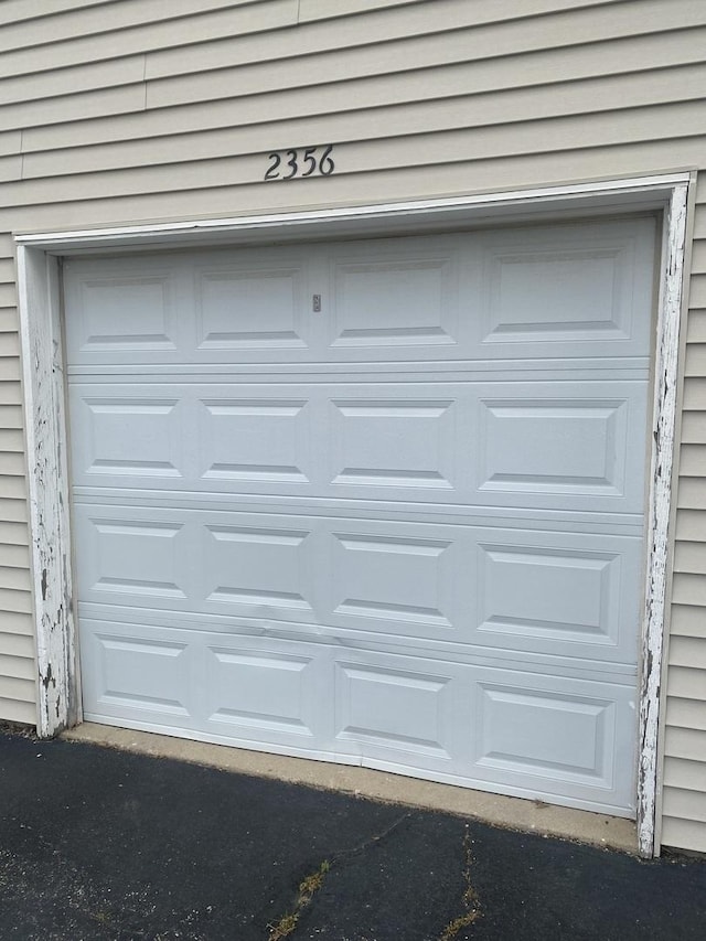 2356 Carnation Dr Unit 0, Crest Hill, IL 60403 - garage with asphalt driveway