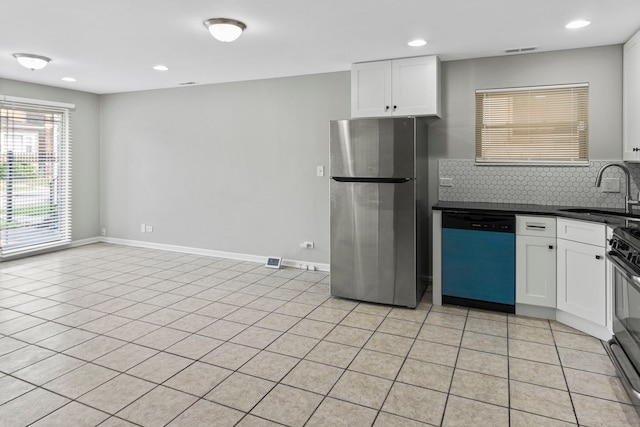 6344 S Rhodes Ave, Chicago, IL 60637 - kitchen featuring stainless steel appliances, a sink, white cabinetry, tasteful backsplash, and recessed lighting