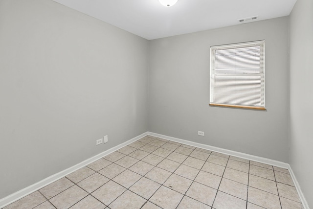 6344 S Rhodes Ave, Chicago, IL 60637 - empty room with light tile patterned flooring and baseboards