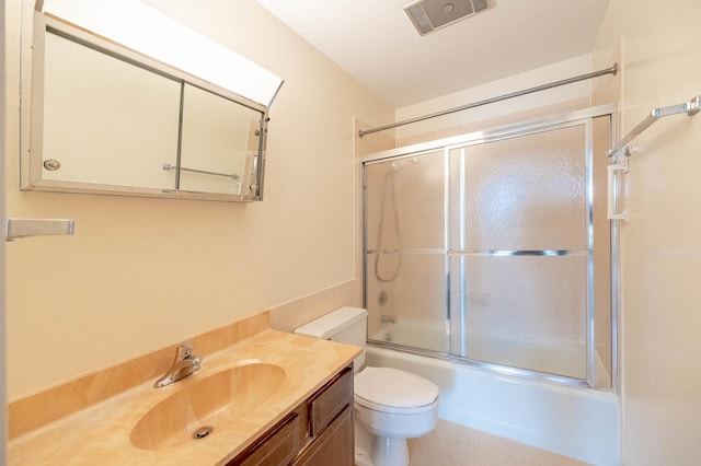 6545 Main St Unit 408, Downers Grove, IL 60516 - bathroom with vanity, toilet, and bath / shower combo with glass door