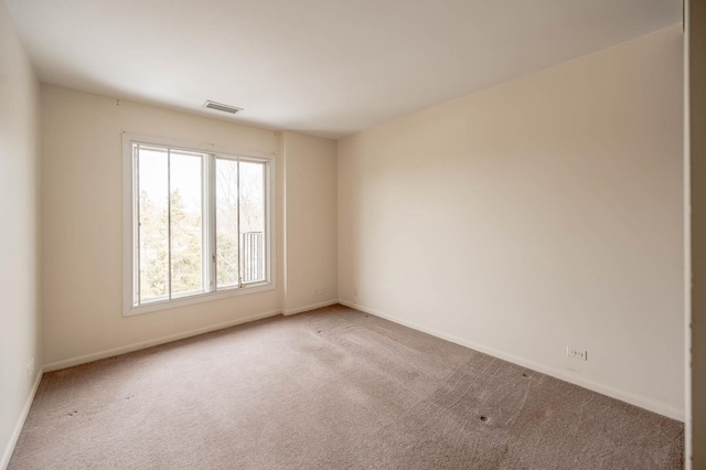 6545 Main St Unit 408, Downers Grove, IL 60516 - carpeted empty room featuring baseboards