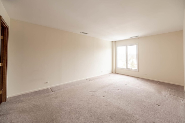 6545 Main St Unit 408, Downers Grove, IL 60516 - carpeted empty room featuring baseboards