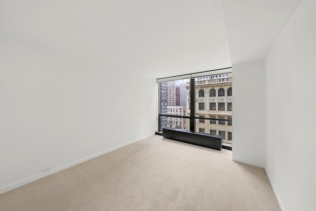 900 N Lake Shore Dr Unit 1104, Chicago, IL 60611 - carpeted spare room featuring baseboards
