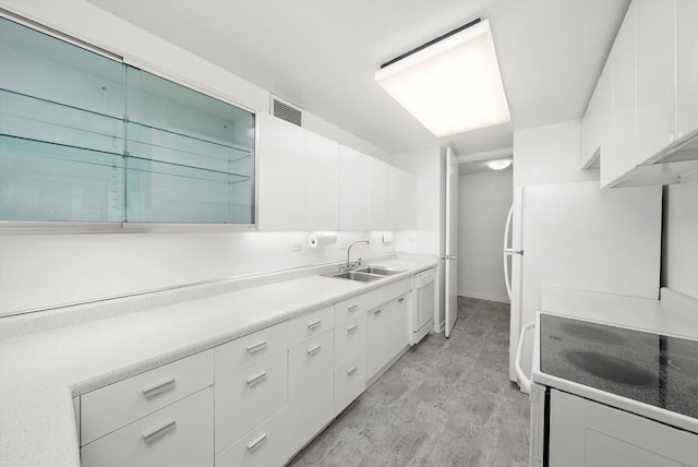 900 N Lake Shore Dr Unit 1104, Chicago, IL 60611 - kitchen with a sink, white appliances, white cabinets, and light countertops