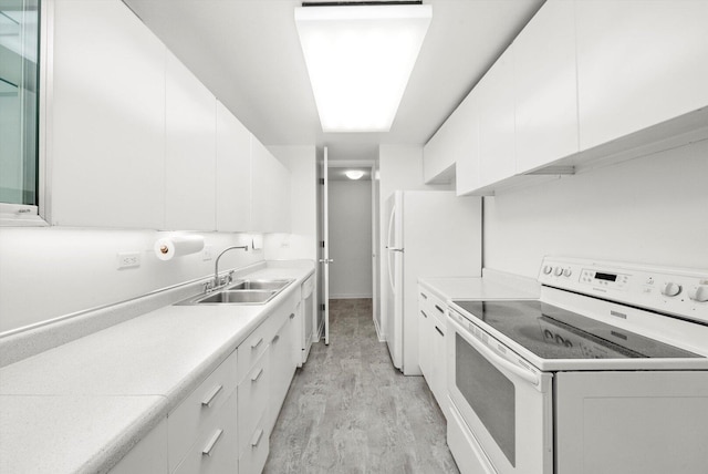 900 N Lake Shore Dr Unit 1104, Chicago, IL 60611 - kitchen with white appliances, a sink, white cabinets, and light countertops
