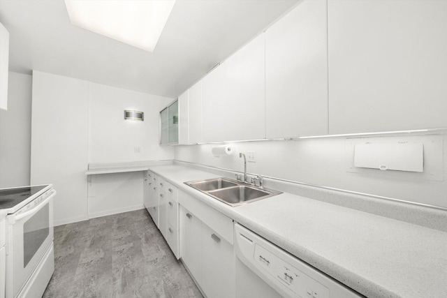 900 N Lake Shore Dr Unit 1104, Chicago, IL 60611 - kitchen with a sink, white appliances, white cabinets, and light countertops