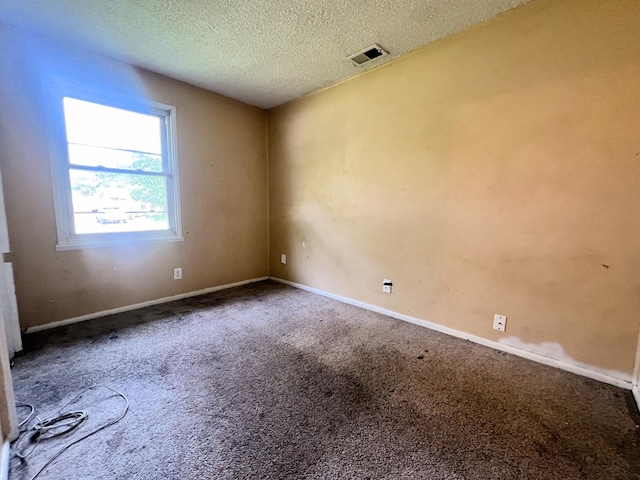 1707 Highview Ave, Mchenry, IL 60050 - carpeted empty room featuring a textured ceiling and baseboards