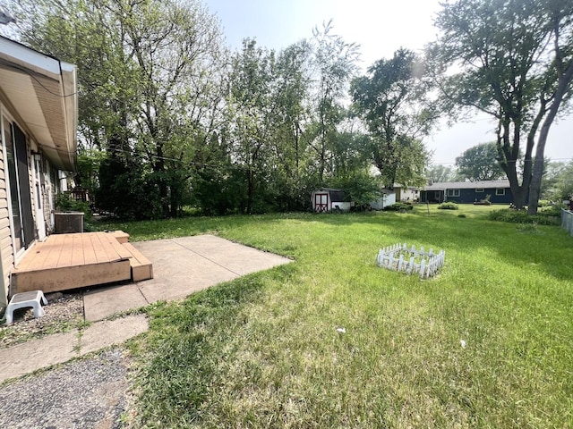 1707 Highview Ave, Mchenry, IL 60050 - view of grassy yard with a patio and a deck