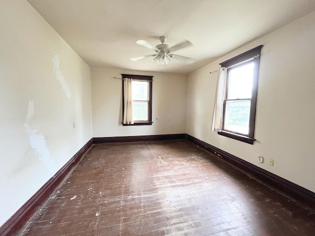 645 E Calhoun St, Woodstock, IL 60098 - spare room with ceiling fan and wood-type flooring
