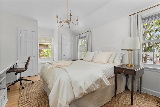 2133 Birchwood Ave, Wilmette, IL 60091 - bedroom with a chandelier, light wood-style flooring, an office area, baseboards, and a closet