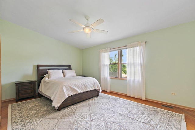 2040 Honey Locust Dr, Algonquin, IL 60102 - bedroom featuring wood finished floors, vaulted ceiling, and ceiling fan