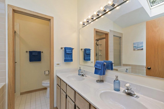 2040 Honey Locust Dr, Algonquin, IL 60102 - full bath featuring a skylight, double vanity, tile patterned flooring, and a shower
