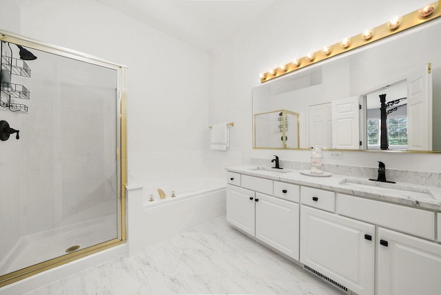 2730 Lorraine Cir, Geneva, IL 60134 - bathroom with a garden tub, a shower stall, double vanity, and marble look tiles