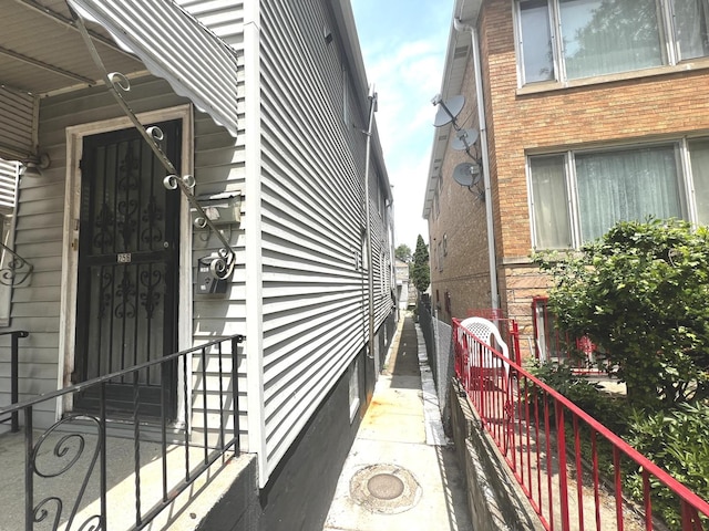 256 W 23rd Pl, Chicago, IL 60616 - view of side of property featuring brick siding