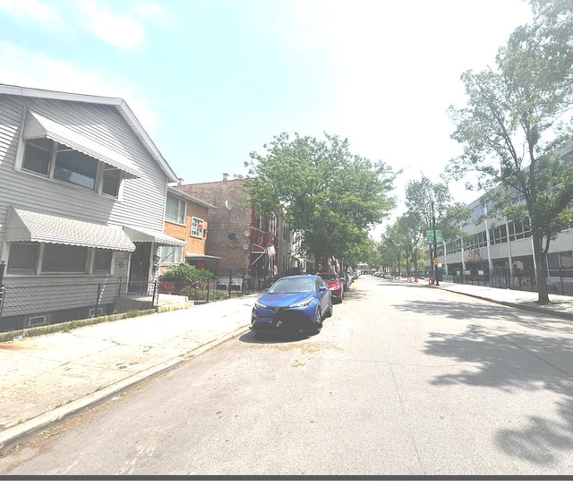256 W 23rd Pl, Chicago, IL 60616 - view of asphalt street featuring curbs and sidewalks