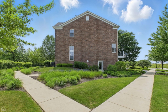 652 Grosvenor Ln, Aurora, IL 60504 - view of home's exterior featuring brick siding