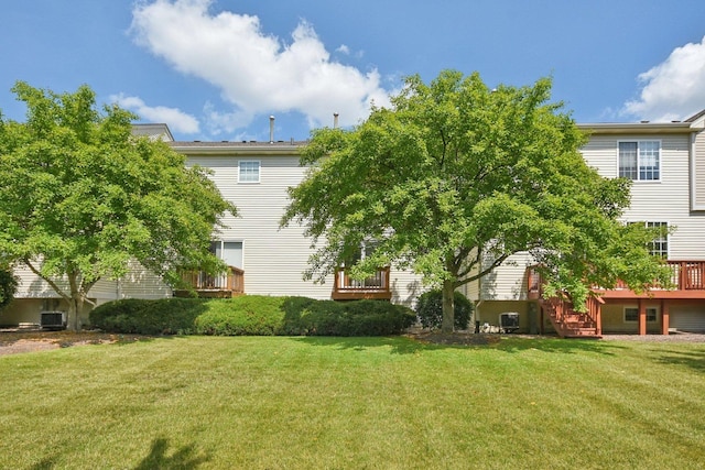 1911 Indian Hill Ln, Aurora, IL 60503 - back of property featuring a lawn and a deck