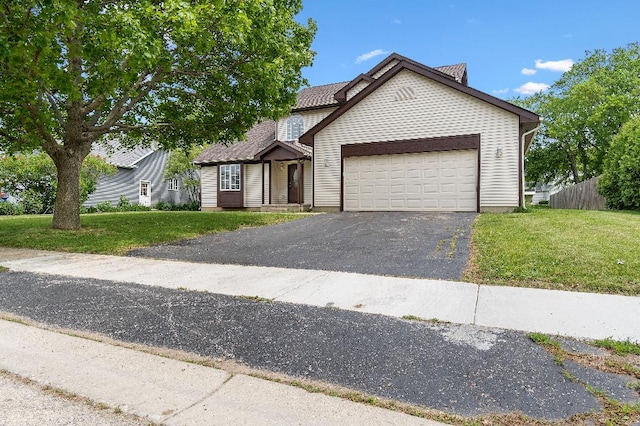 933 Tralee Ct, Gurnee, IL 60031 - view of front of property featuring an attached garage and asphalt driveway