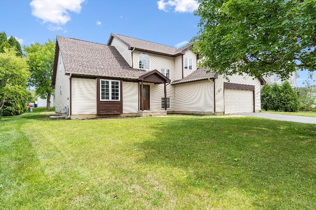 933 Tralee Ct, Gurnee, IL 60031 - traditional-style house with an attached garage, driveway, a front lawn, and a shingled roof