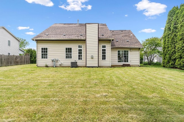 933 Tralee Ct, Gurnee, IL 60031 - back of house with a chimney and roof with shingles