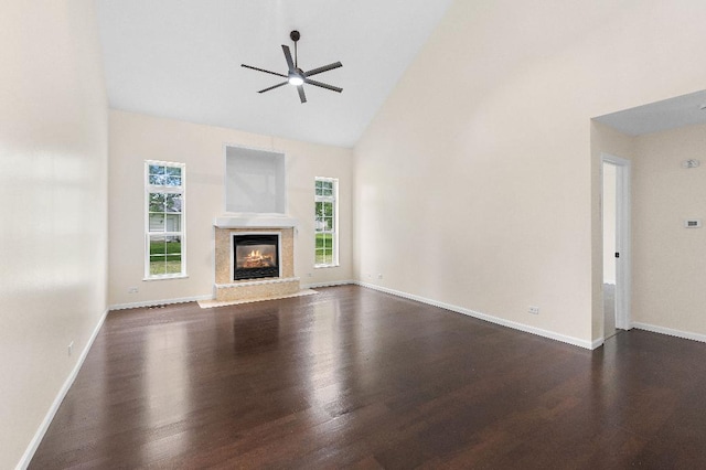 933 Tralee Ct, Gurnee, IL 60031 - unfurnished living room featuring a ceiling fan, dark wood-style floors, high vaulted ceiling, baseboards, and a fireplace