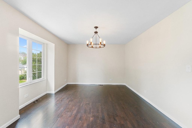 933 Tralee Ct, Gurnee, IL 60031 - spare room featuring wood finished floors, a chandelier, and baseboards