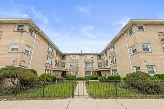 6964 W Diversey Ave Unit 7, Chicago, IL 60707 - view of apartment building / complex with a fenced front yard