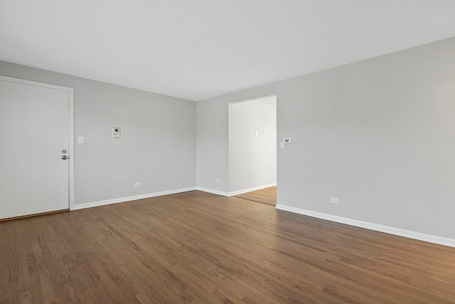 6964 W Diversey Ave Unit 7, Chicago, IL 60707 - unfurnished room with wood finished floors and baseboards