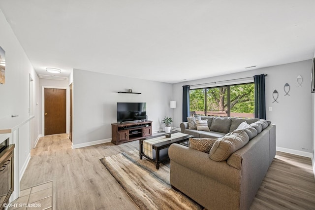 2980 Northampton Dr Unit A2, Rolling Meadows, IL 60008 - living area featuring light wood-style floors and baseboards