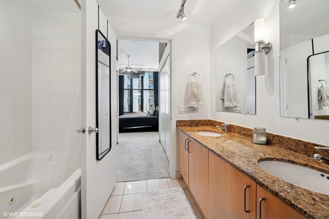 333 W Hubbard St Unit 708, Chicago, IL 60654 - full bath with ensuite bath, double vanity, shower / washtub combination, tile patterned flooring, and ceiling fan