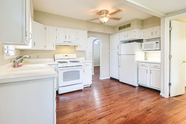 359 Elm St, Elgin, IL 60123 - kitchen with white appliances, under cabinet range hood, a sink, a ceiling fan, and white cabinets
