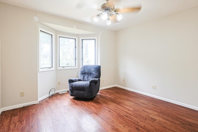 359 Elm St, Elgin, IL 60123 - sitting room featuring wood finished floors, a ceiling fan, and baseboards