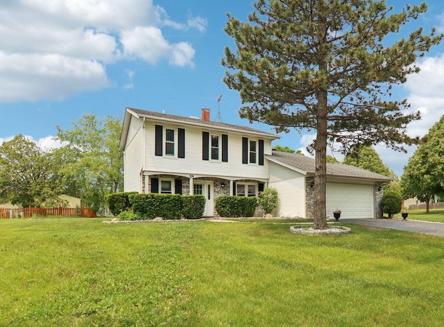 104 S Walnut Ln, Schaumburg, IL 60193 - view of front of property featuring an attached garage, driveway, and a chimney