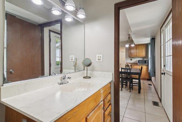 104 S Walnut Ln, Schaumburg, IL 60193 - bathroom with tile patterned flooring and vanity