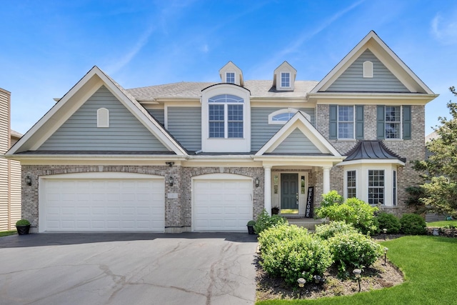 6 Valhalla Ct, Lake In The Hills, IL 60156 - view of front of house with driveway, brick siding, and a front yard