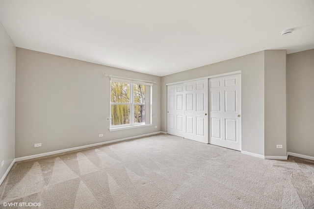 6 Valhalla Ct, Lake In The Hills, IL 60156 - unfurnished bedroom featuring baseboards, carpet floors, and a closet