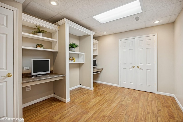 6 Valhalla Ct, Lake In The Hills, IL 60156 - unfurnished office with built in study area, light wood finished floors, baseboards, recessed lighting, and a paneled ceiling